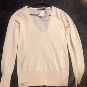 The Limited sheer cream sweater.